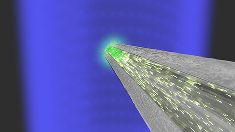 Antenne optique coupl&eacute;e &agrave; un agr&eacute;gat de scintillateurs plac&eacute; &agrave; l'extr&eacute;mit&eacute; d'une fibre optique.